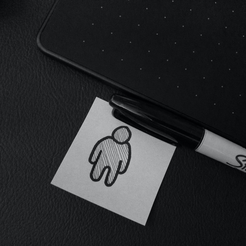 person drawn on sticky note and sharpie marker